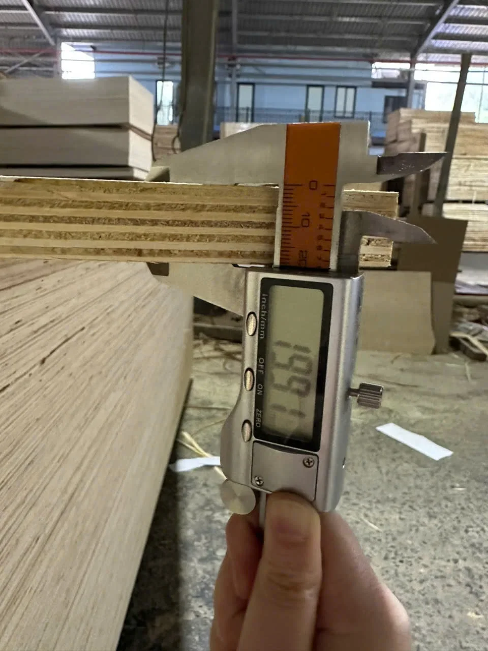 QC thickness inspection — 18mm plywood quality inspection at Vietnam factory, verifying export specifications for US buyers